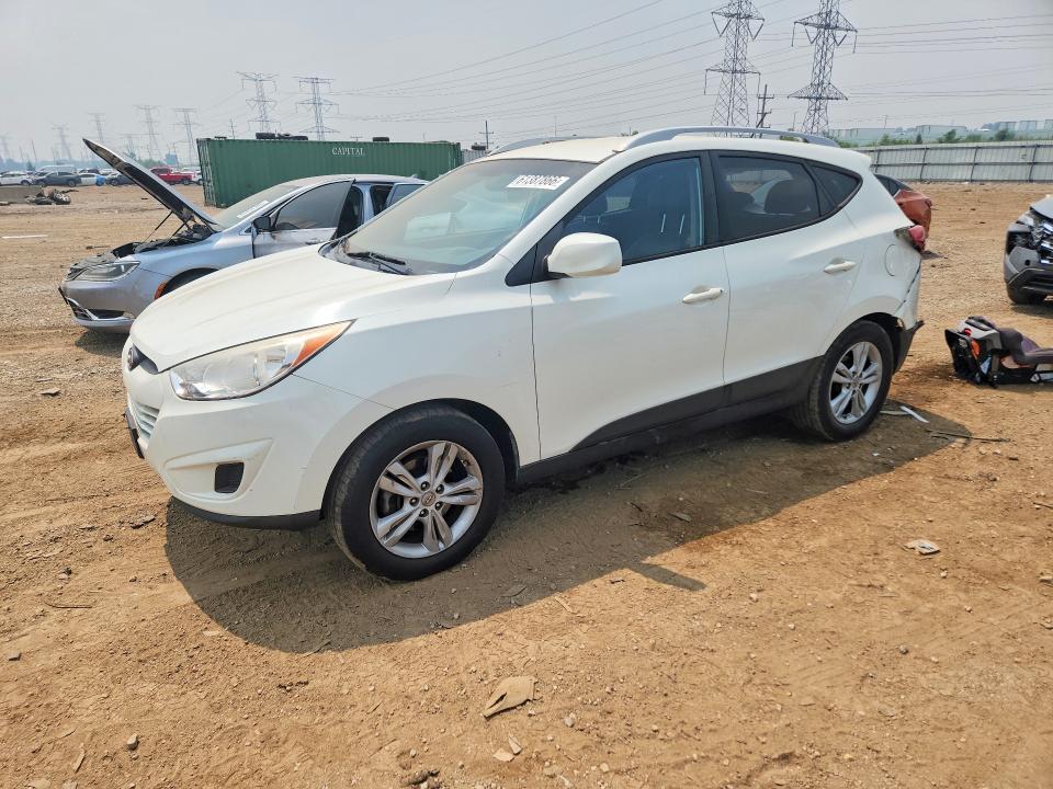HYUNDAI TUCSON 2011 with VIN KM8JUCAC0BU243804 - Photo from auction