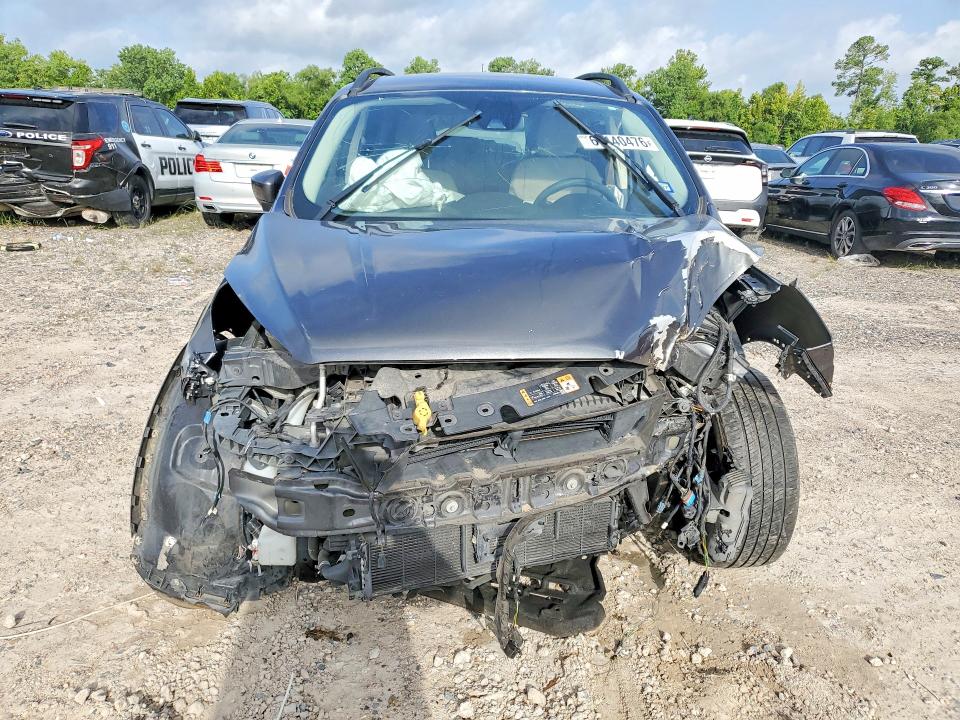 Photo 5 from auction – 2018 FORD ESCAPE with VIN 1FMCU9GD6JUB16890
