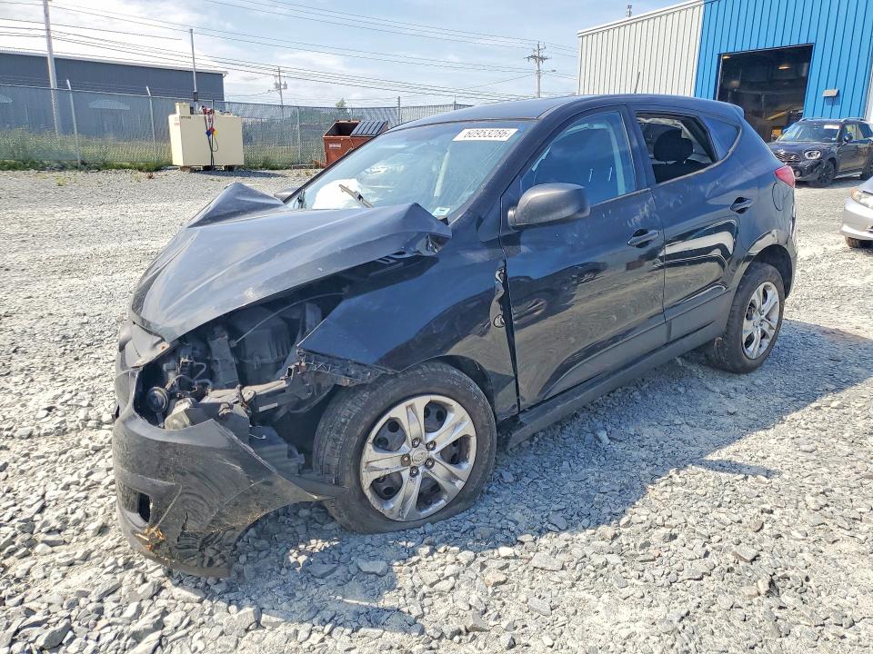 HYUNDAI TUCSON 2014 with VIN KM8JTCAFXEU832165 - Photo from auction