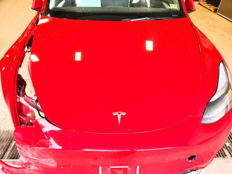 Photo 11 from auction – 2023 TESLA MODEL Y with VIN 7SAYGAEE6PF788810