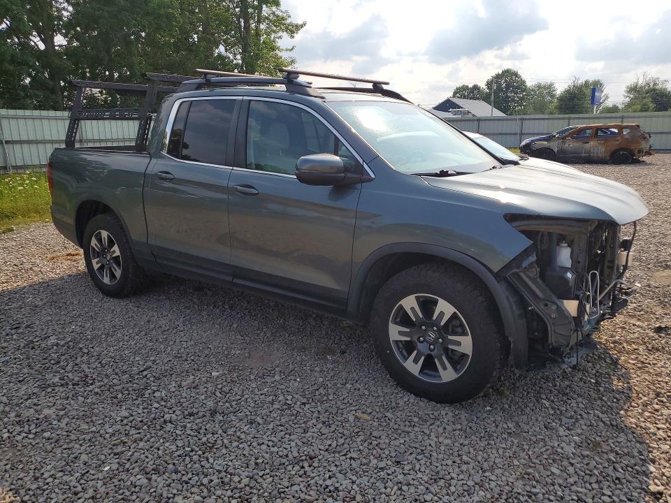 Photo 4 from auction – 2019 HONDA RIDGELINE with VIN 5FPYK3F55KB040782