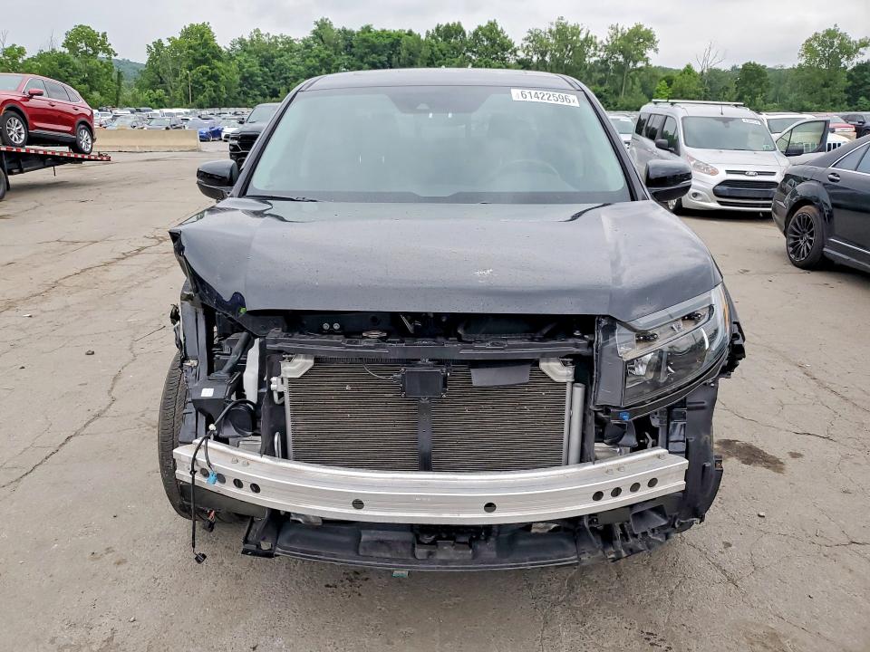 Photo 5 from auction – 2023 HONDA RIDGELINE with VIN 5FPYK3F52PB026393