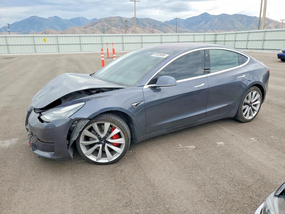 TESLA MODEL 3 2018 with VIN 5YJ3E1EB7JF151418 - Photo from auction