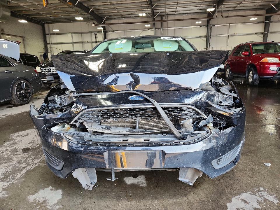 Photo 5 from auction – 2016 FORD FOCUS with VIN 1FADP3F23GL330687