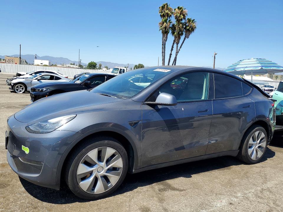 TESLA MODEL Y 2023 with VIN 7SAYGDEE6PA035051 - Photo from auction