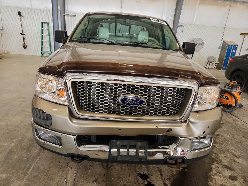 Photo 5 from auction – 2004 FORD F150 with VIN 1FTPW14504KB46367