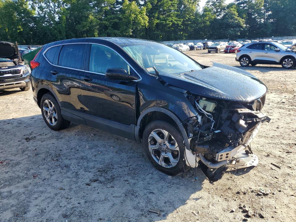 Photo 4 from auction – 2018 HONDA CR-V with VIN 7FARW2H81JE062011