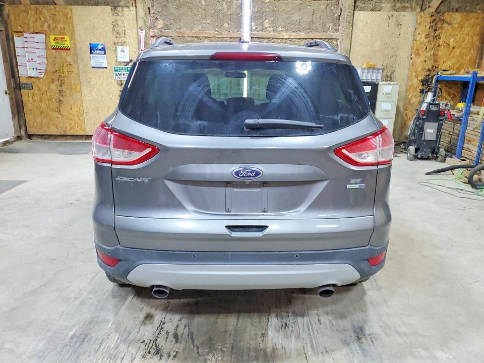 Photo 6 from auction – 2014 FORD ESCAPE with VIN 1FMCU9GX1EUA05485