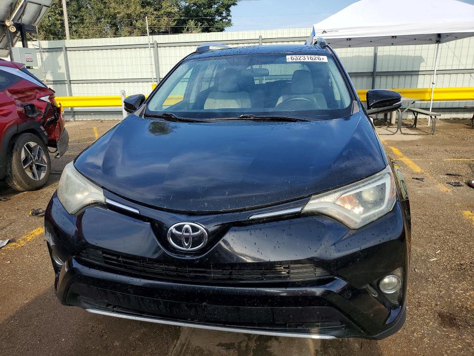 Photo 5 from auction – 2016 TOYOTA RAV4 with VIN 2T3RFREV1GW535844