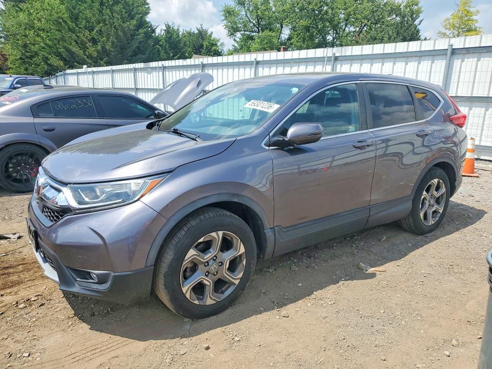 Photo 1 from auction – 2018 HONDA CR-V with VIN 2HKRW2H83JH678550