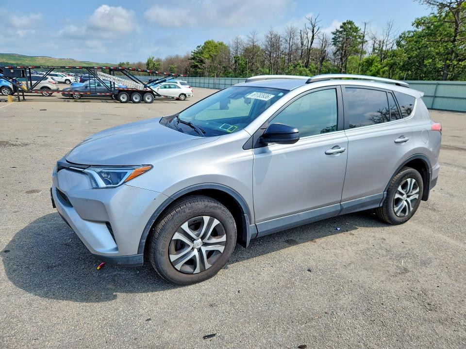 TOYOTA RAV4 2018 with VIN 2T3BFREV0JW744386 - Photo from auction