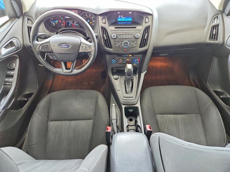 Photo 8 from auction – 2016 FORD FOCUS with VIN 1FADP3F25GL372584