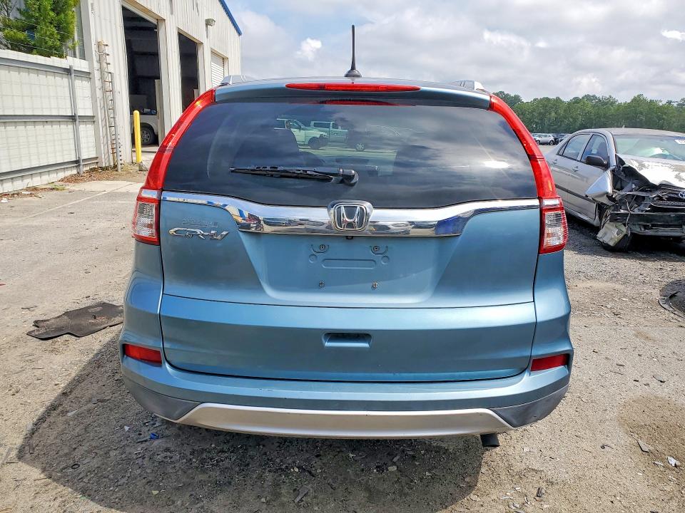 Photo 6 from auction – 2016 HONDA CR-V with VIN 2HKRM3H71GH549086