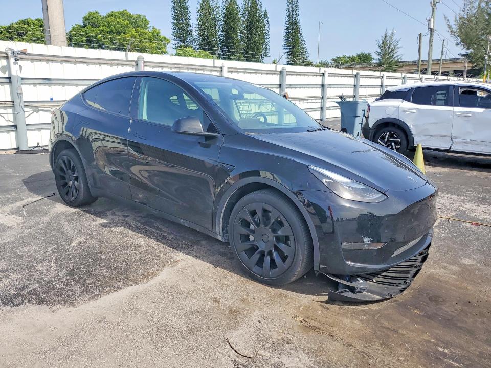 Photo 4 from auction – 2025 TESLA MODEL Y with VIN 7SAYGDEE3SA353492