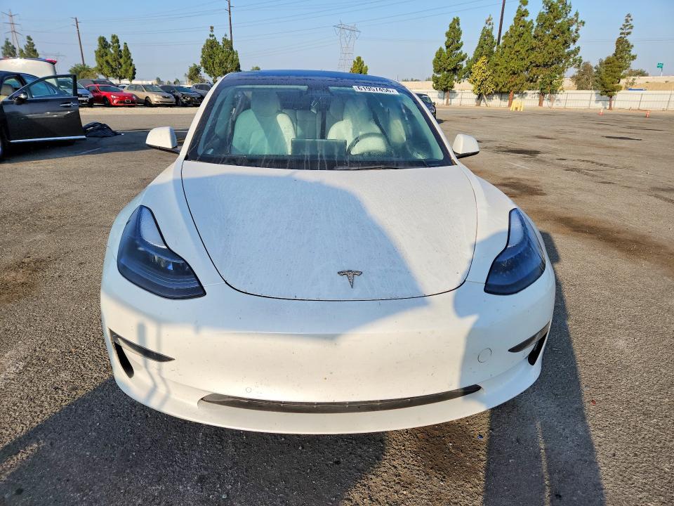 Photo 5 from auction – 2022 TESLA MODEL 3 with VIN 5YJ3E1EA7NF124510