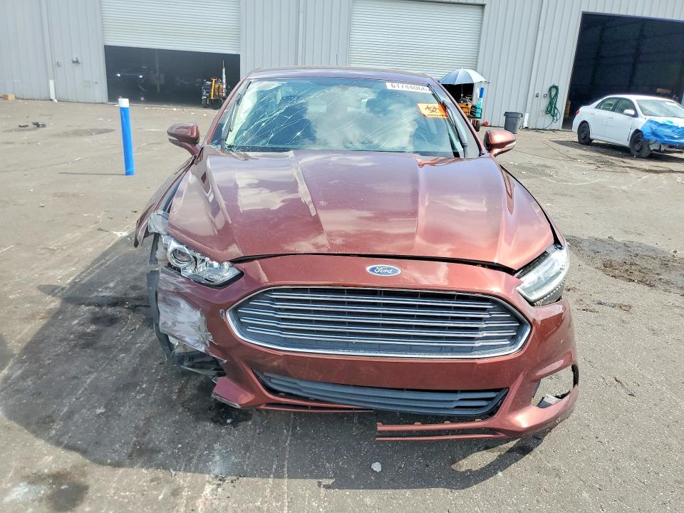Photo 5 from auction – 2016 FORD FUSION with VIN 3FA6P0HDXGR220842