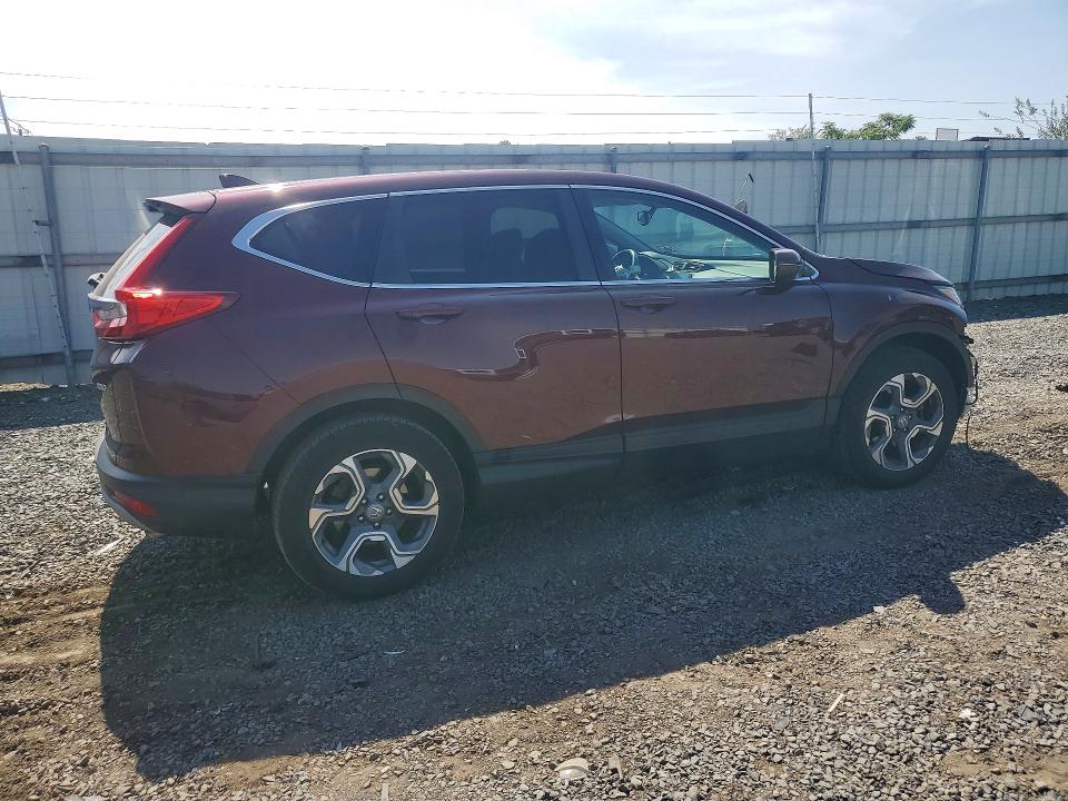 Photo 3 from auction – 2018 HONDA CR-V with VIN 7FARW2H85JE044997