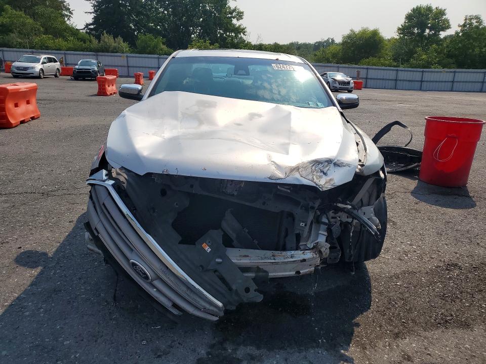 Photo 5 from auction – 2017 FORD TAURUS with VIN 1FAHP2J80HG109632