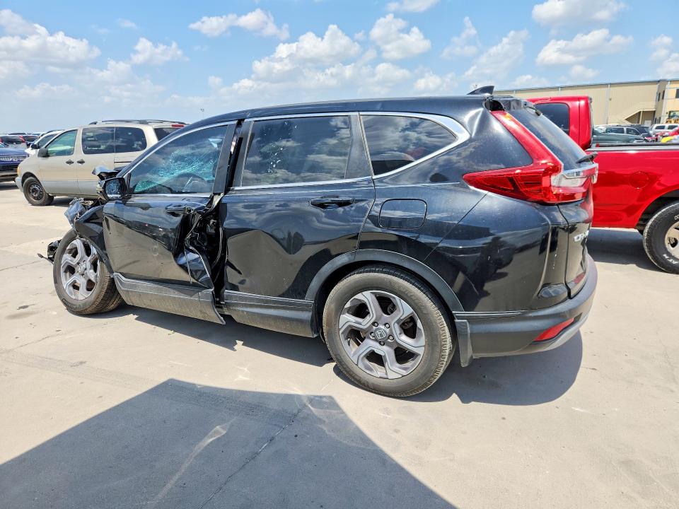 Photo 2 from auction – 2018 HONDA CR-V with VIN 7FARW1H8XJE037568