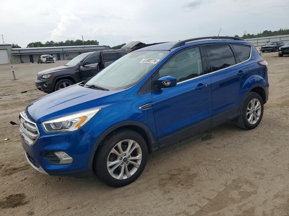 FORD ESCAPE 2018 with VIN 1FMCU0GD8JUC04495 - Photo from auction