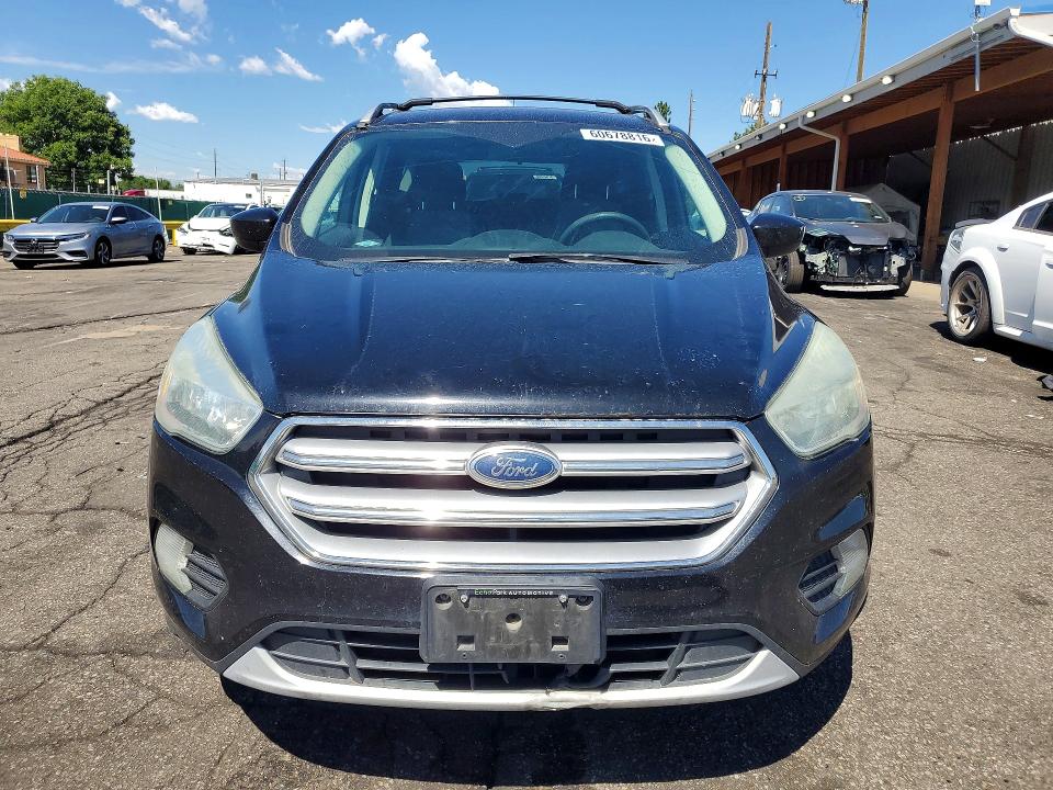 Photo 5 from auction – 2017 FORD ESCAPE with VIN 1FMCU9G99HUA95474