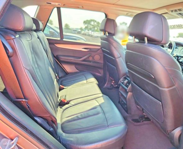 Photo 11 from auction – 2014 BMW X5 with VIN 5UXKS4C5XE0J94303
