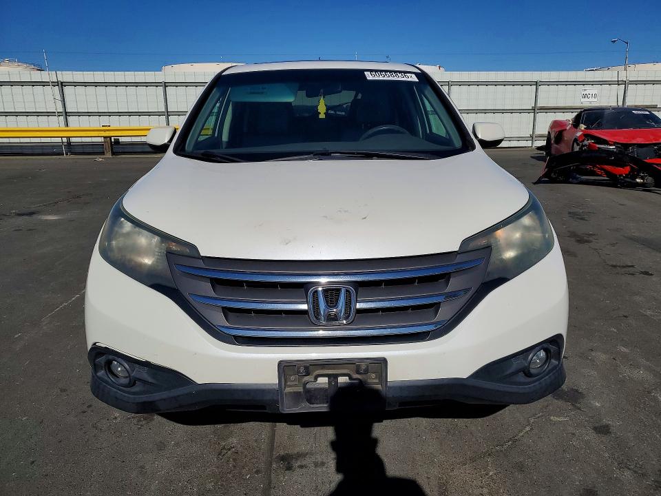 Photo 5 from auction – 2014 HONDA CR-V with VIN 5J6RM3H59EL028490