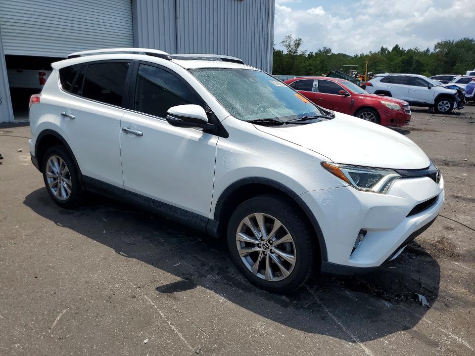 Photo 4 from auction – 2018 TOYOTA RAV4 with VIN 2T3YFREV7JW448811