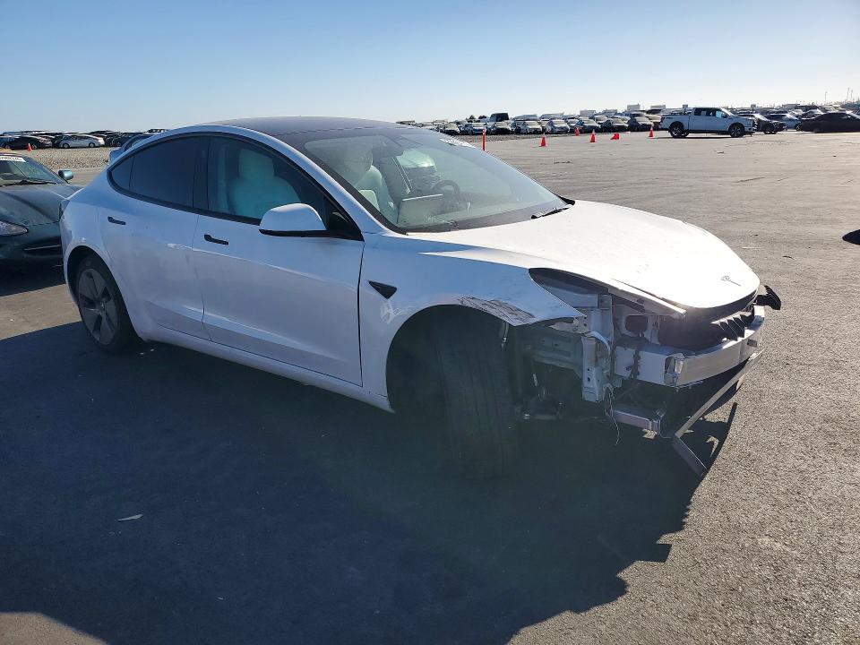 Photo 4 from auction – 2021 TESLA MODEL 3 with VIN 5YJ3E1EA2MF096694