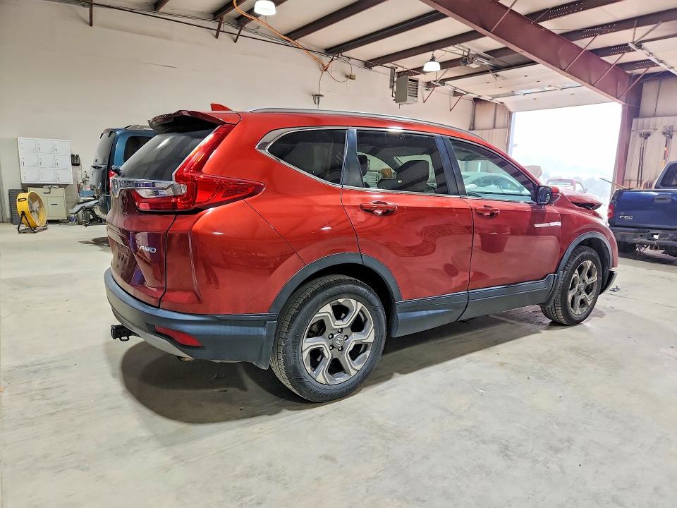 Photo 3 from auction – 2019 HONDA CR-V with VIN 2HKRW2H88KH604297