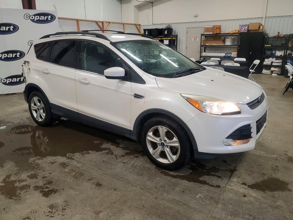 Photo 4 from auction – 2016 FORD ESCAPE with VIN 1FMCU0GX5GUB29984