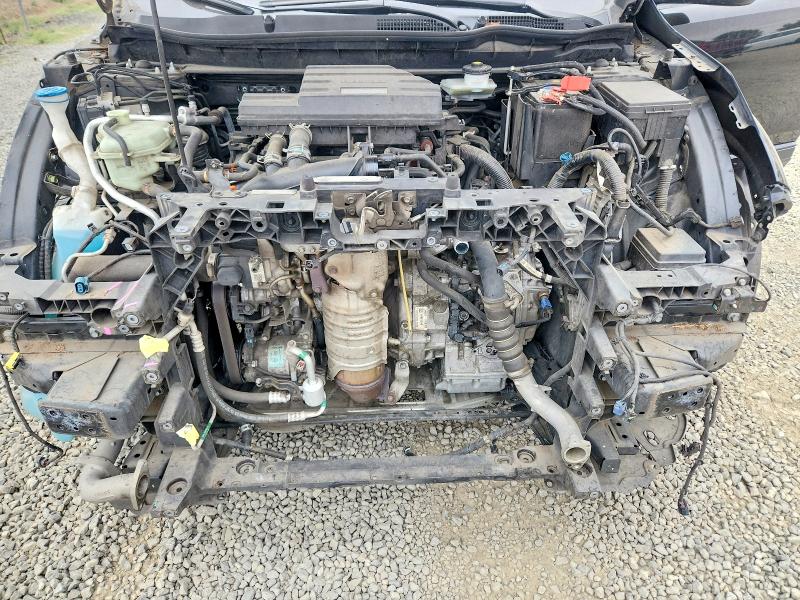Photo 12 from auction – 2017 HONDA CR-V with VIN 2HKRW2H85HH676079