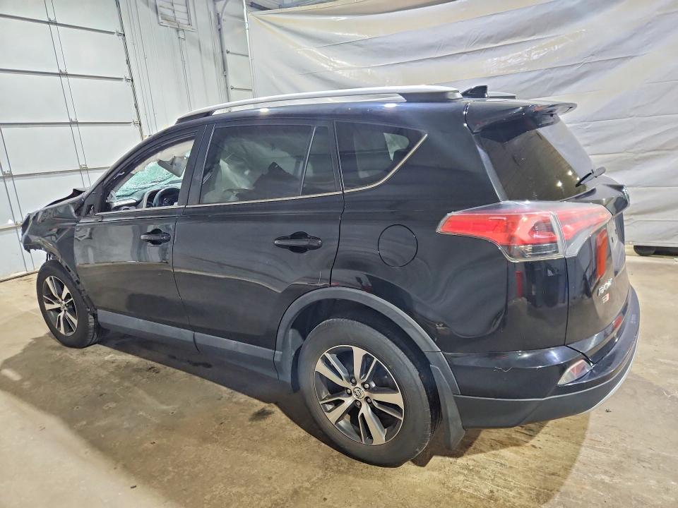 Photo 2 from auction – 2016 TOYOTA RAV4 with VIN 2T3RFREV2GW459972