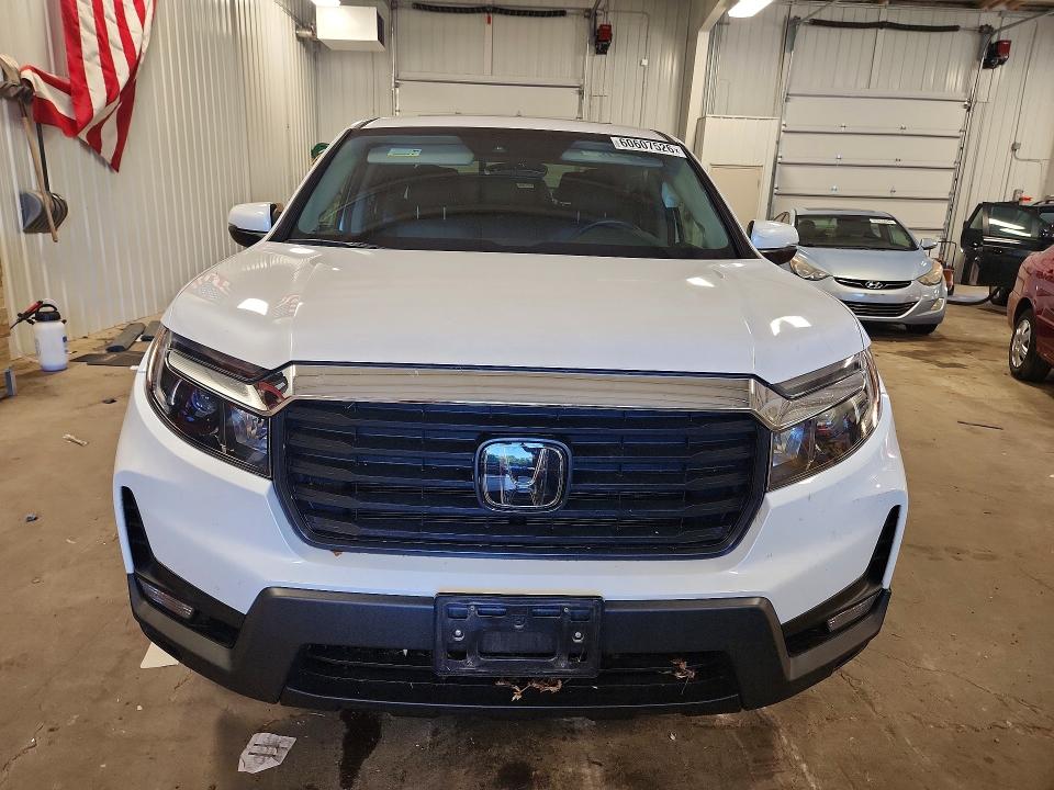 Photo 5 from auction – 2023 HONDA RIDGELINE with VIN 5FPYK3F5XPB004562