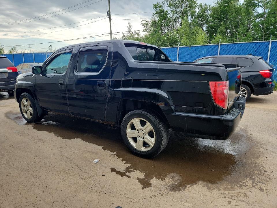 Photo 2 from auction – 2010 HONDA RIDGELINE with VIN 5FPYK1F59AB001471