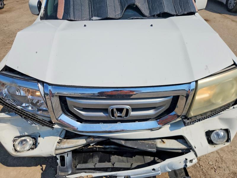 Photo 12 from auction – 2011 HONDA PILOT with VIN 5FNYF3H56BB052630