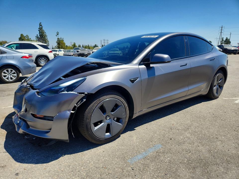 TESLA MODEL 3 2022 with VIN 5YJ3E1EB9NF135842 - Photo from auction