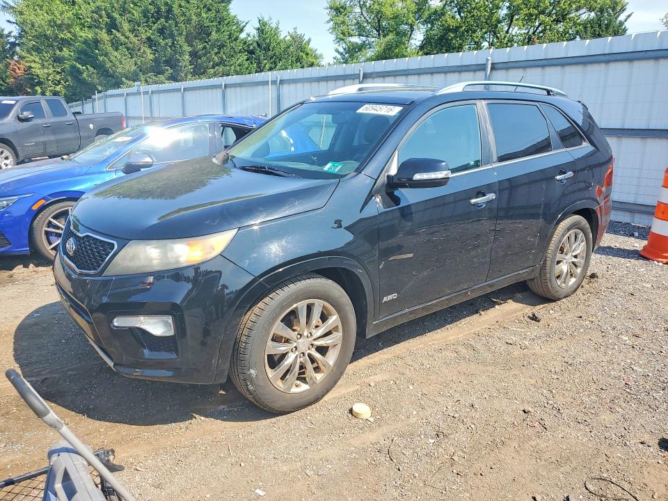 KIA SORENTO 2012 with VIN 5XYKWDA2XCG242212 - Photo from auction