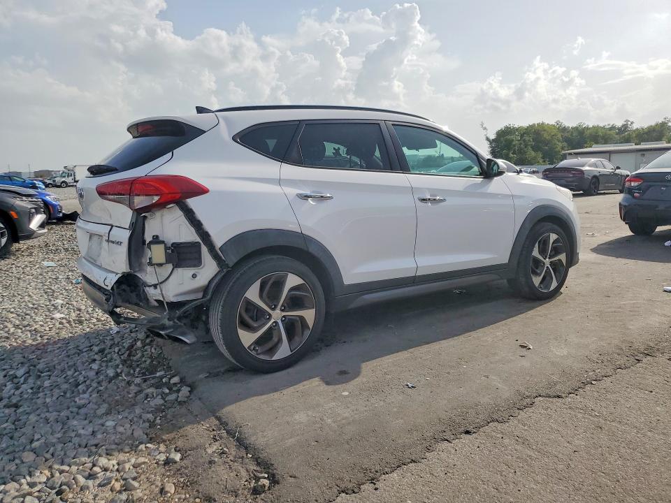 Photo 3 from auction – 2016 HYUNDAI TUCSON with VIN KM8J33A22GU025879