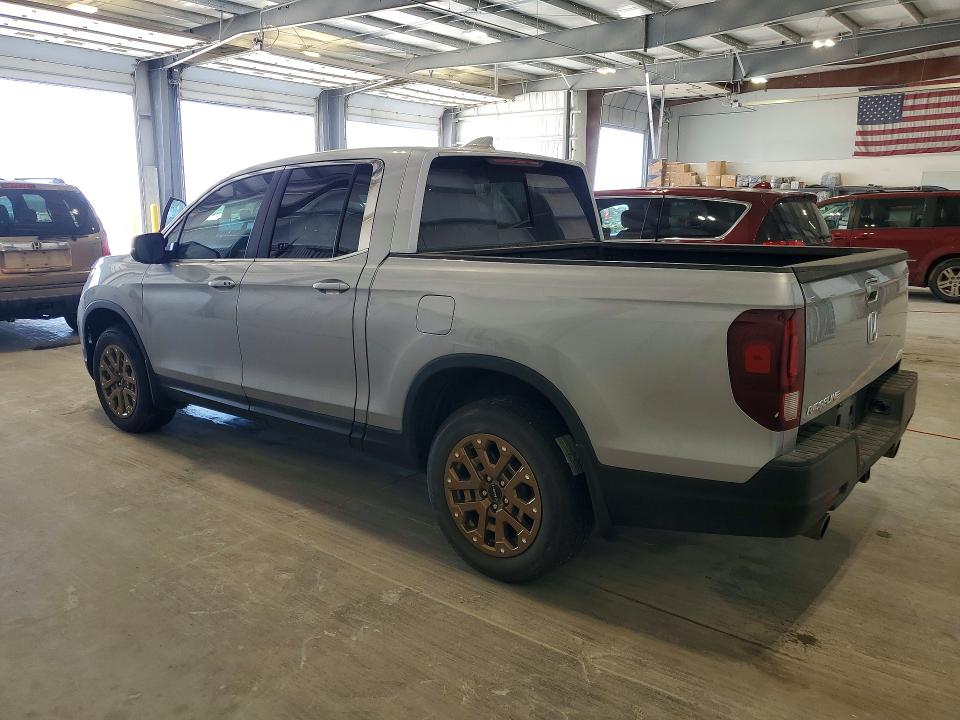 Photo 2 from auction – 2023 HONDA RIDGELINE with VIN 5FPYK3F51PB059515