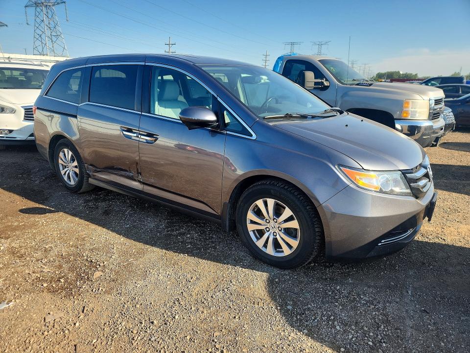 Photo 4 from auction – 2014 HONDA ODYSSEY with VIN 5FNRL5H64EB106867