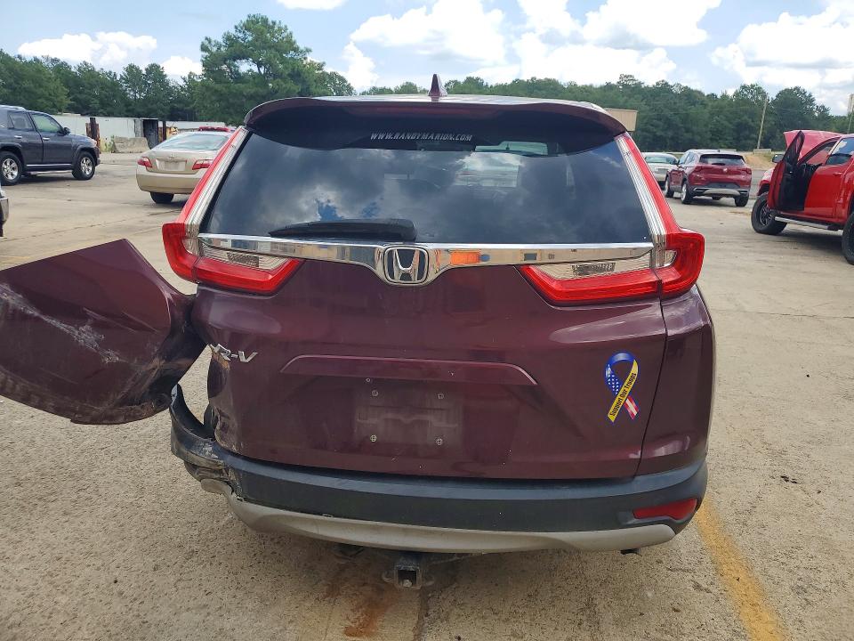 Photo 6 from auction – 2017 HONDA CR-V with VIN 7FARW1H52HE028833