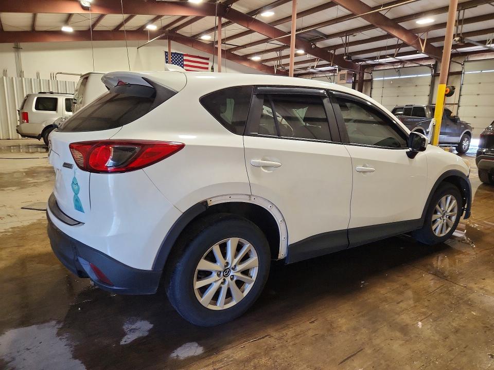 Photo 3 from auction – 2014 MAZDA CX-5 with VIN JM3KE4CY0E0381818