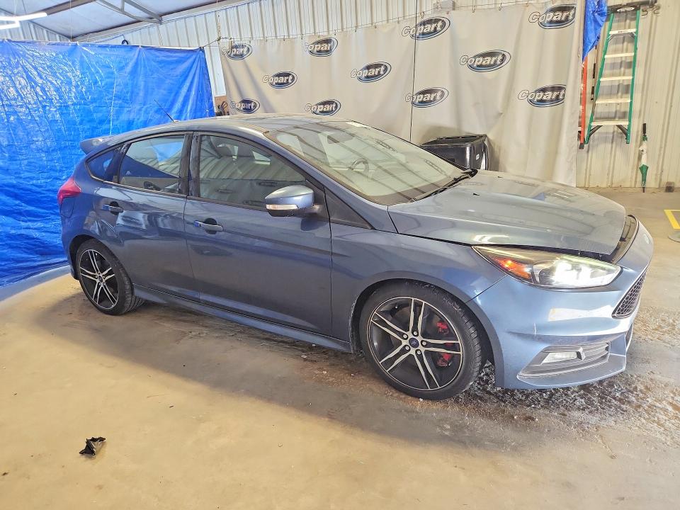 Photo 4 from auction – 2018 FORD FOCUS with VIN 1FADP3L99JL245457