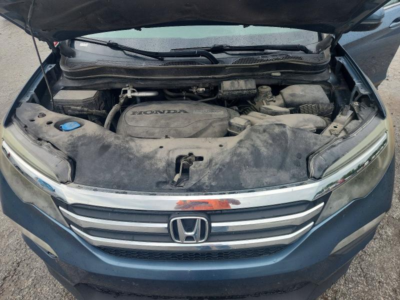 Photo 12 from auction – 2016 HONDA PILOT with VIN 5FNYF6H54GB009848