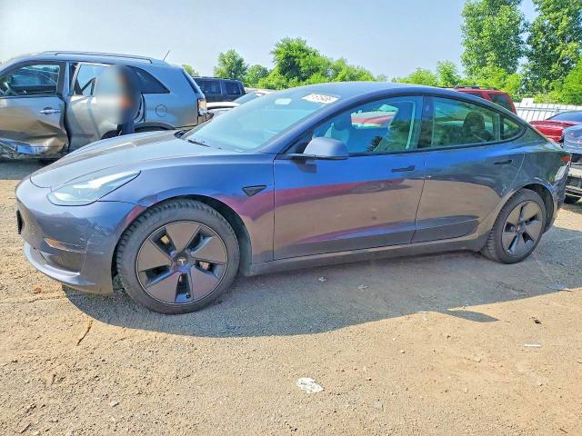 TESLA MODEL 3 2023 with VIN LRW3E1FA2PC876174 - Photo from auction