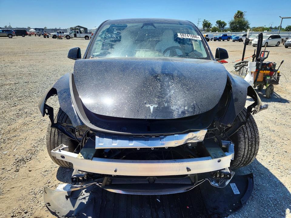 Photo 5 from auction – 2025 TESLA MODEL Y with VIN 7SAYGAEEXSF271552