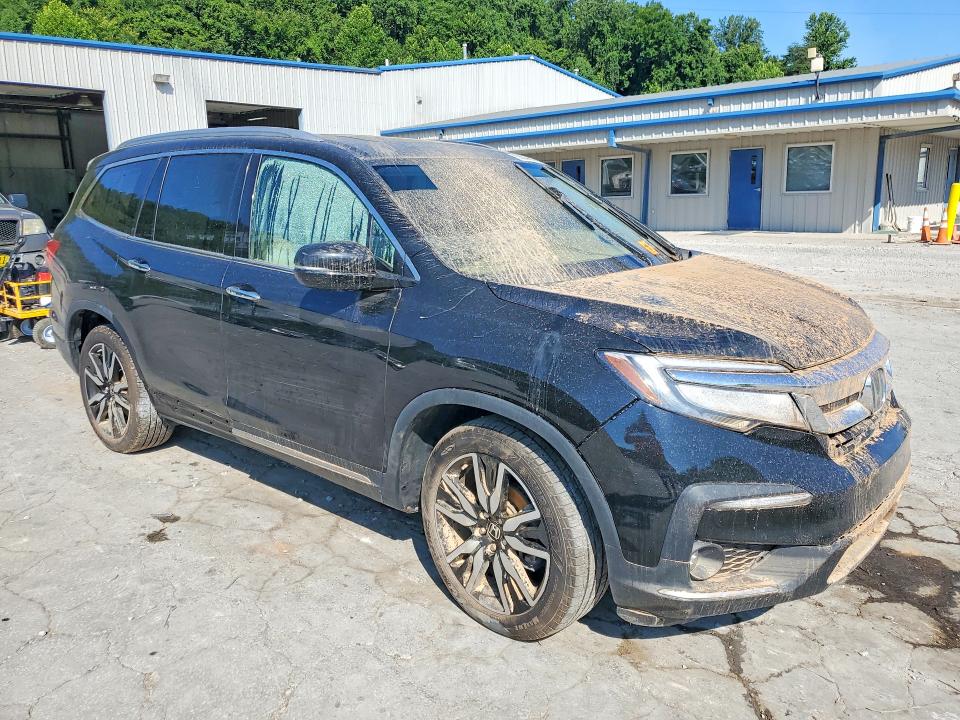 Photo 4 from auction – 2022 HONDA PILOT with VIN 5FNYF6H03NB042874