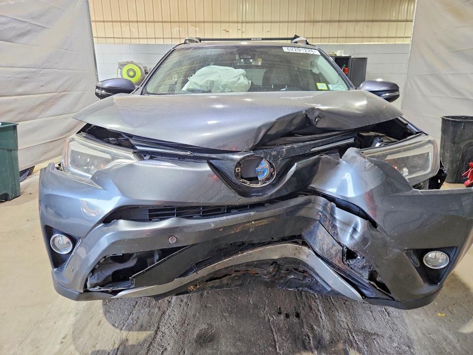 Photo 5 from auction – 2016 TOYOTA RAV4 HV with VIN JTMDJREV7GD048914