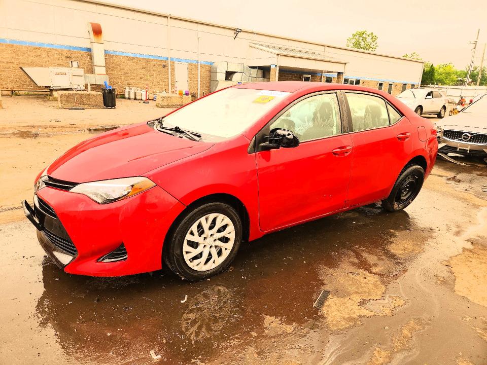 TOYOTA COROLLA 2017 with VIN 2T1BURHE0HC779855 - Photo from auction